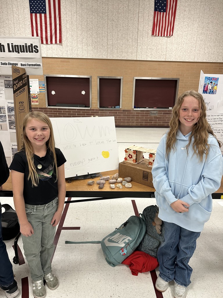 students with science fair project