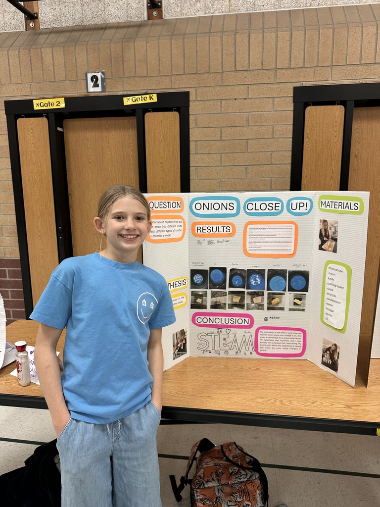 Student with science fair project