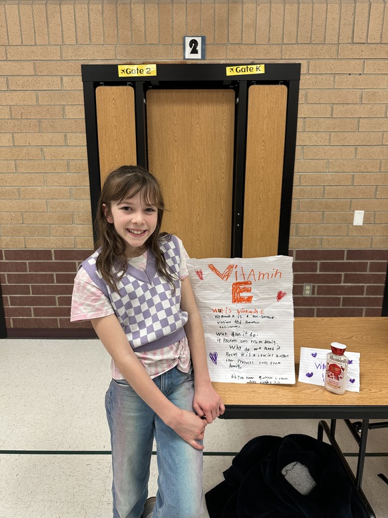Student with science fair project on Vit E