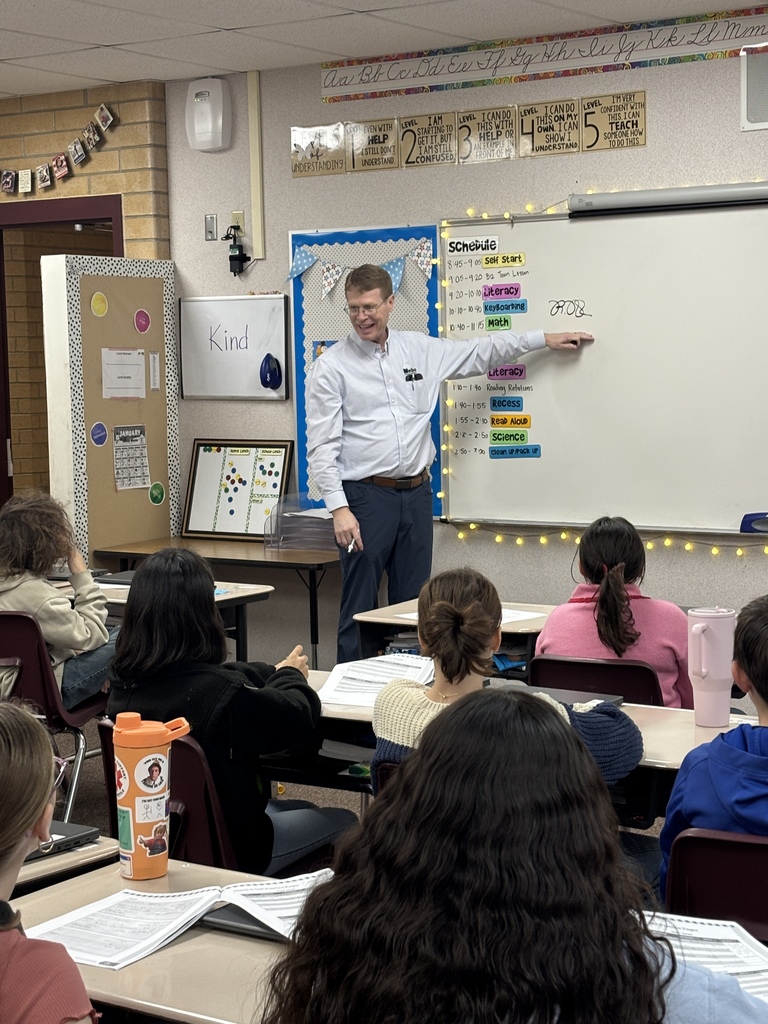 Superintendent teaching the students