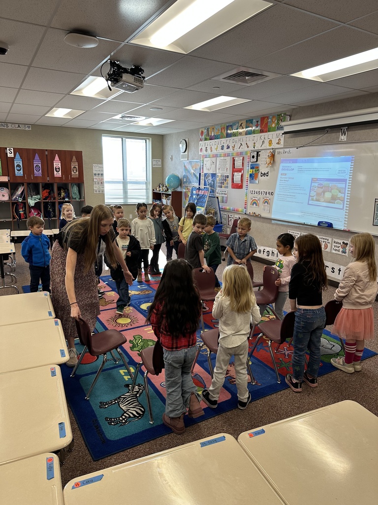 students learning from their teacher