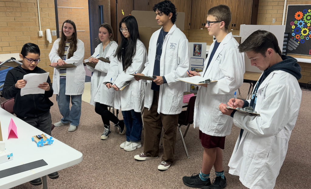 Science students helping with the elementary Science fair!