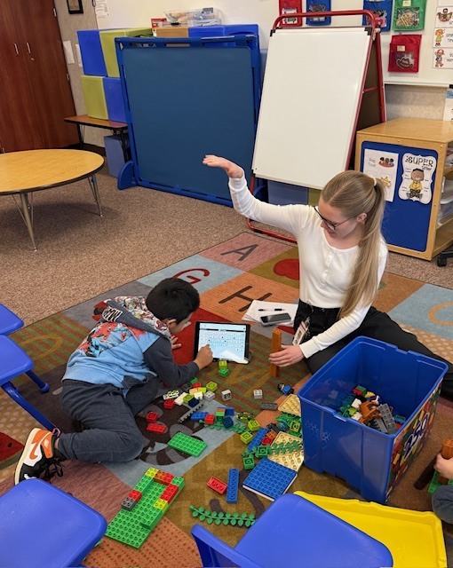 speech tech working with a student