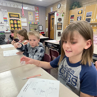 Students learning about the life cycle from Thanksgiving point