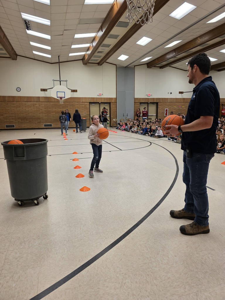 basketball assembly for pride card recipients along with student of the month for january