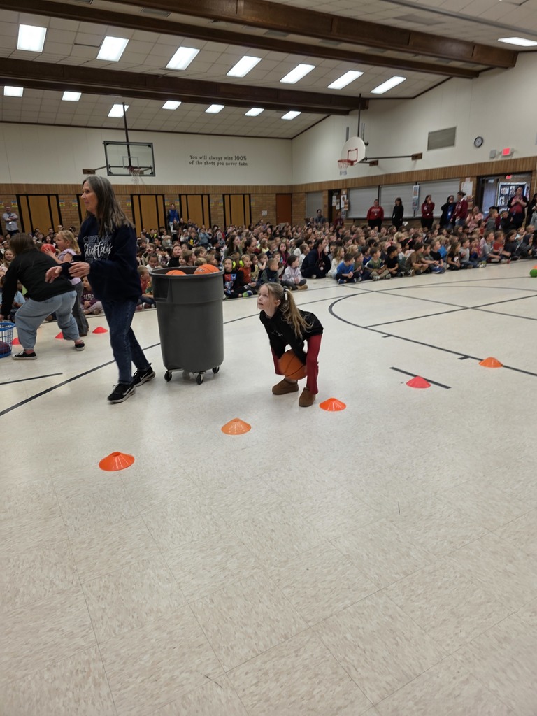 basketball assembly for pride card recipients along with student of the month for january
