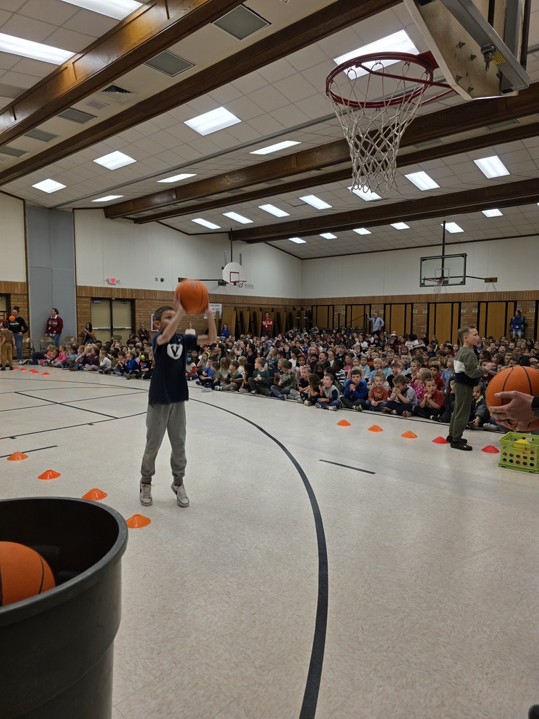basketball assembly for pride card recipients along with student of the month for january