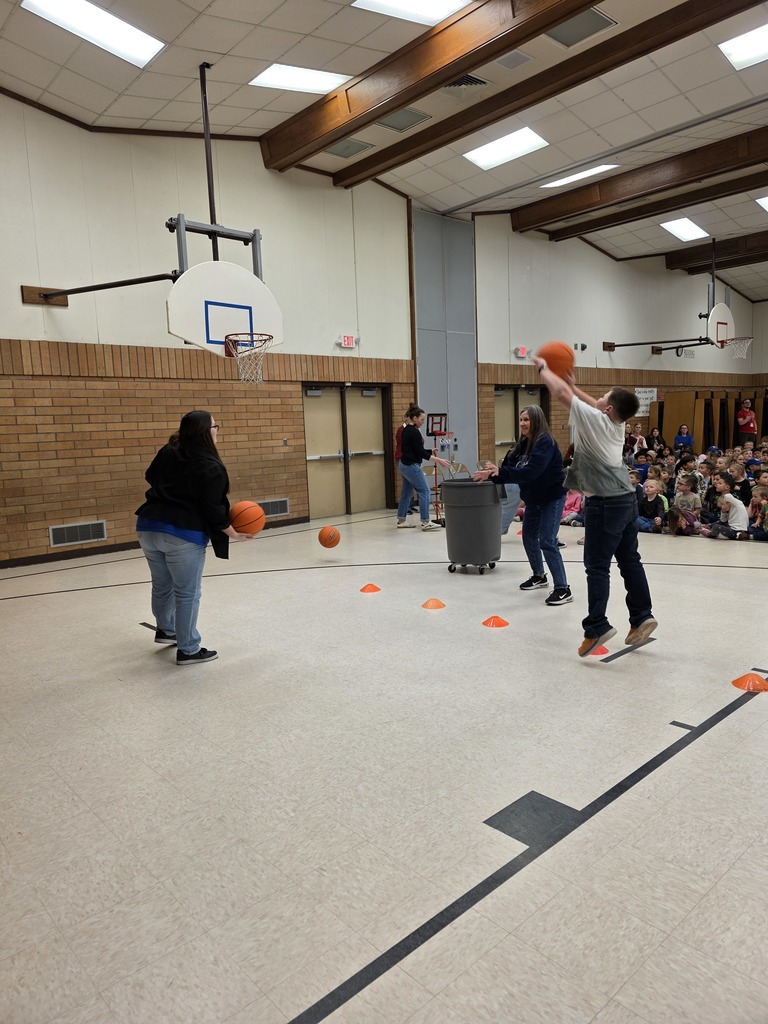basketball assembly for pride card recipients along with student of the month for january