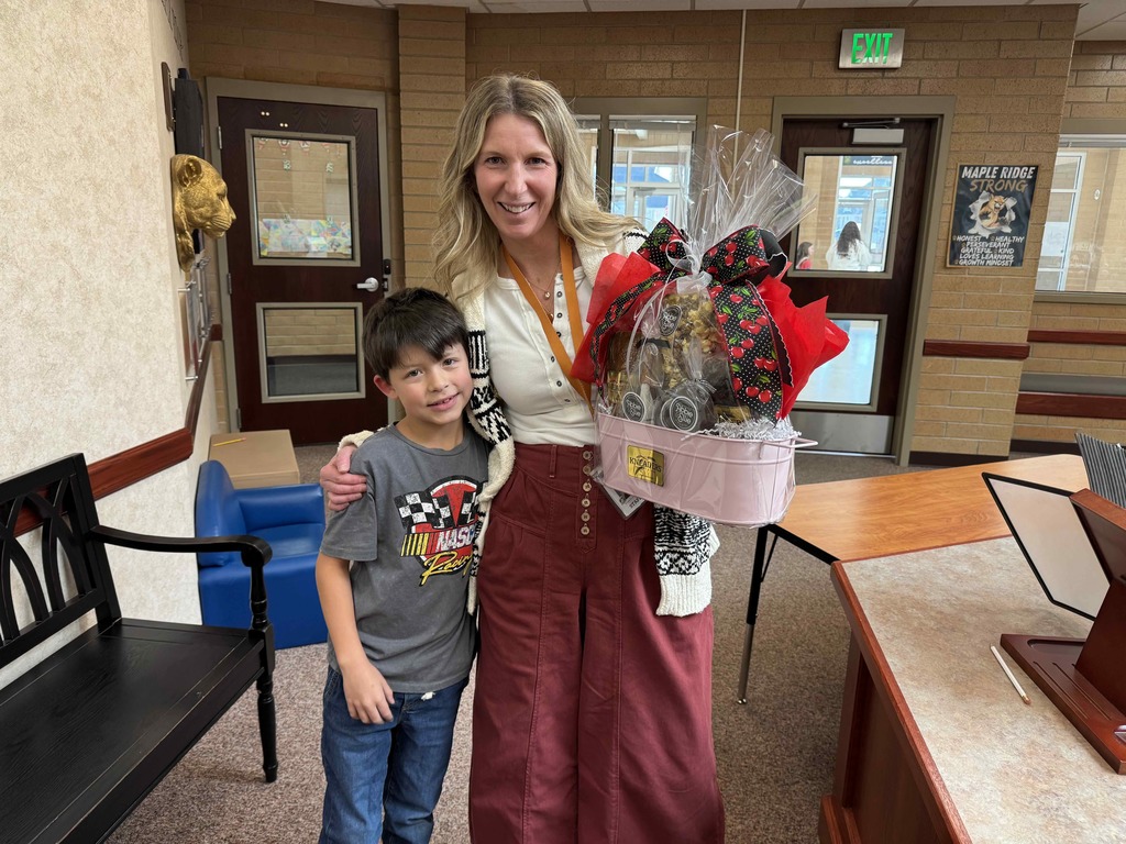 Ms. Bree and a student.