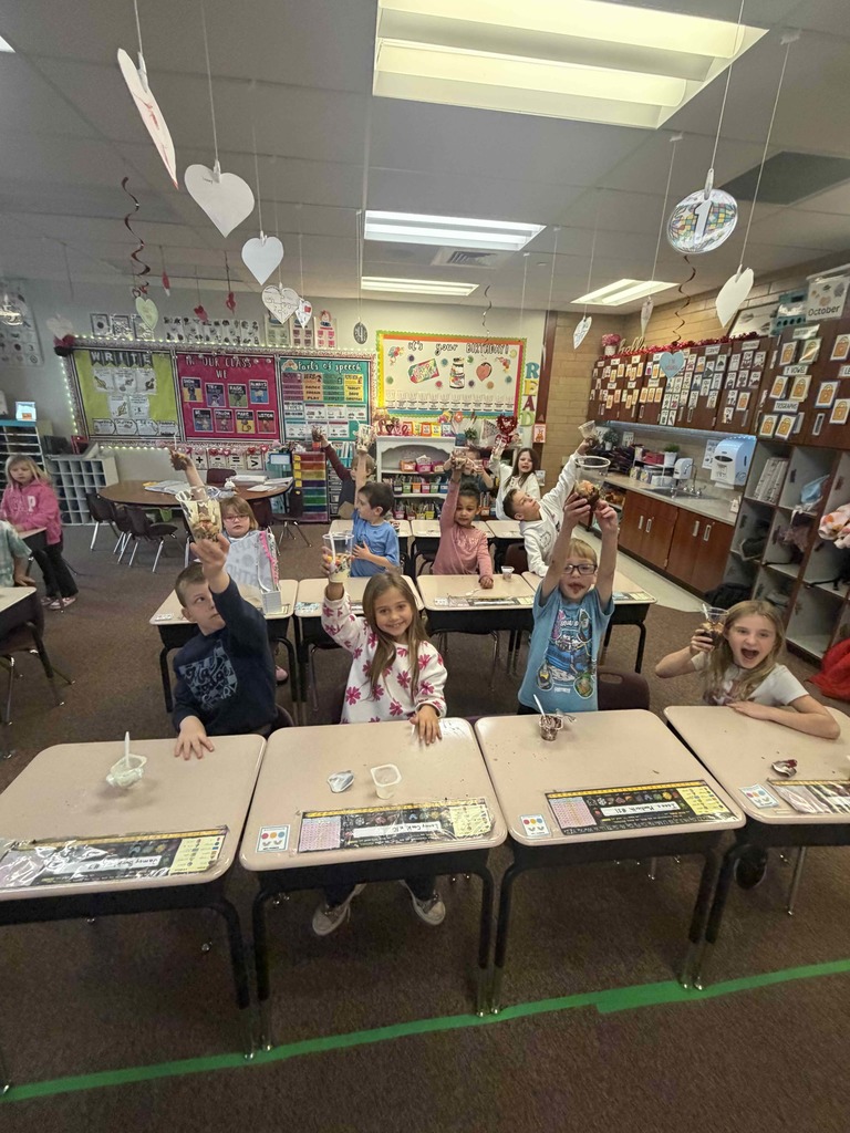 Students using treats to study layers of the earth.