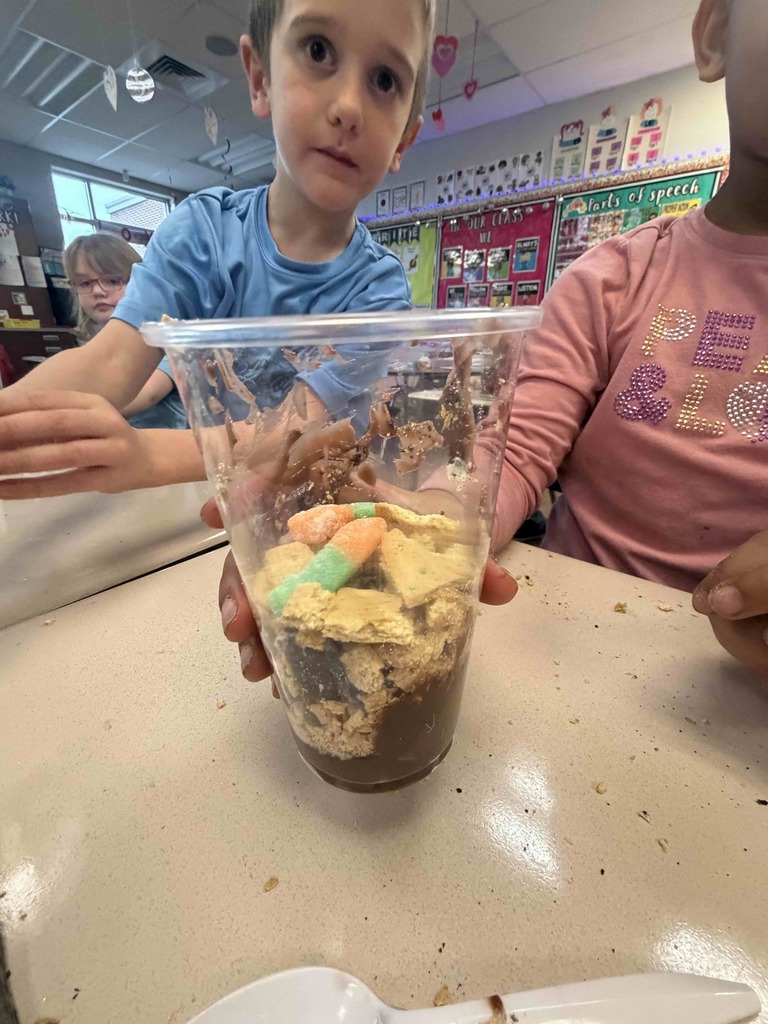 Students using treats to study layers of the earth.