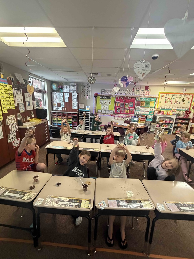 Students using treats to study layers of the earth.