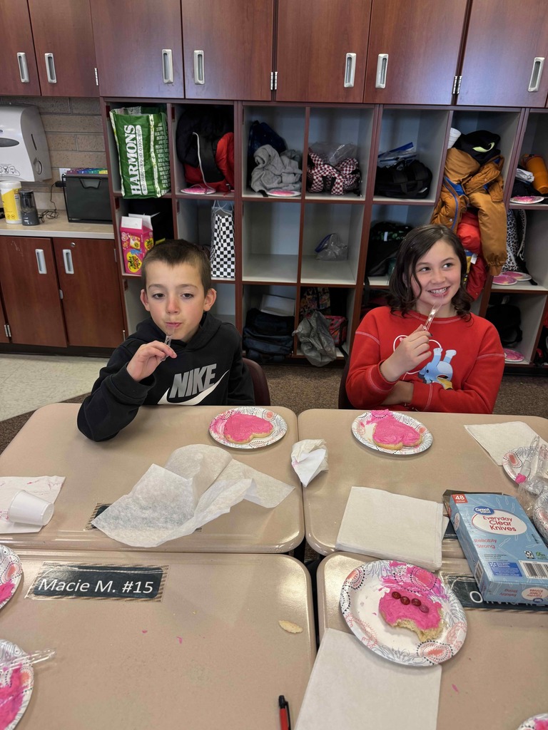 Students decorating cookies.