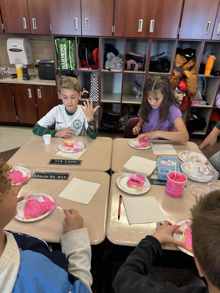 Students decorating cookies.