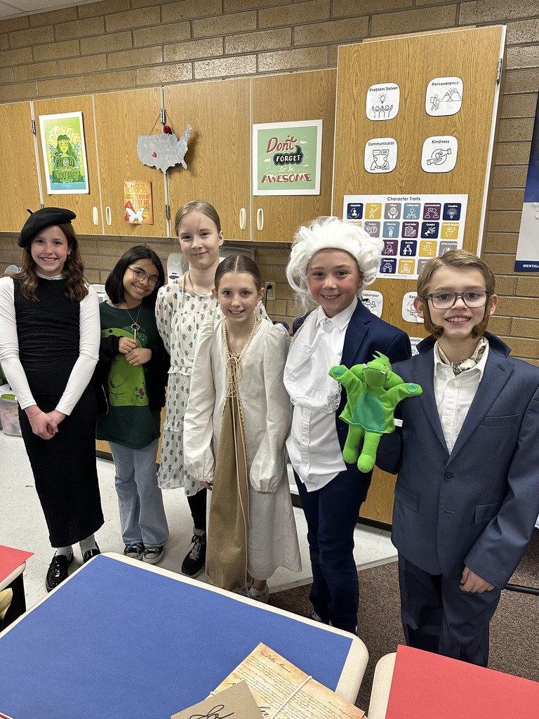 group of 5th grade students dressed up as presidents and presidents wives
