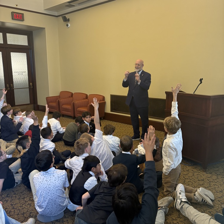 students learning from Representative Walton