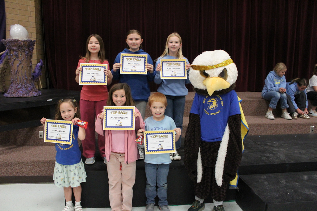February Top Eagles pose for a picture with their certificates and ACE the Eagle.