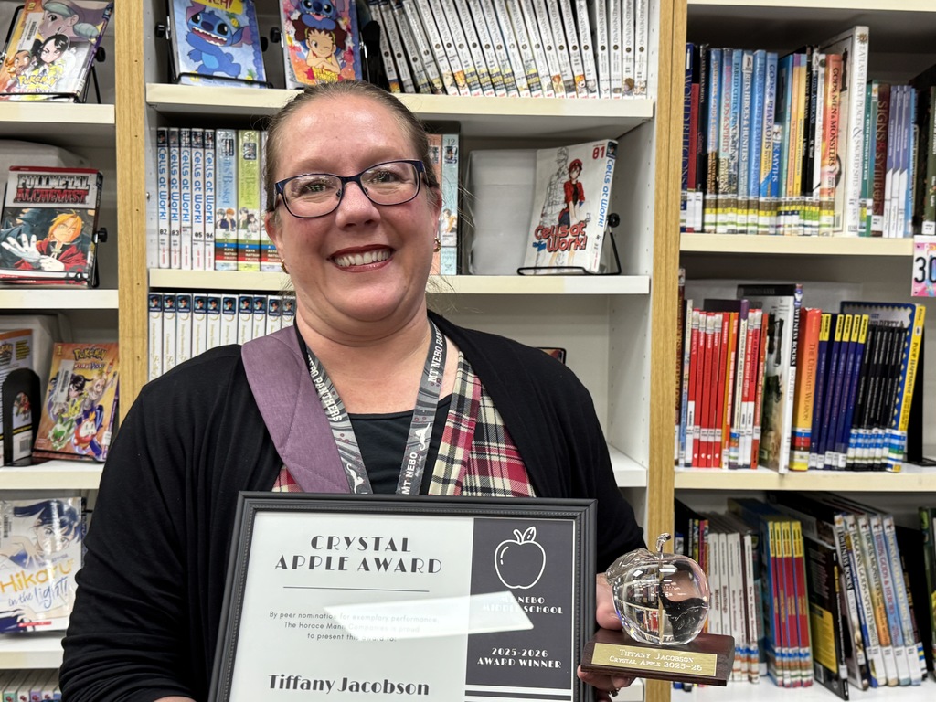 Mrs. Jacobson receives the Crystal Apple award