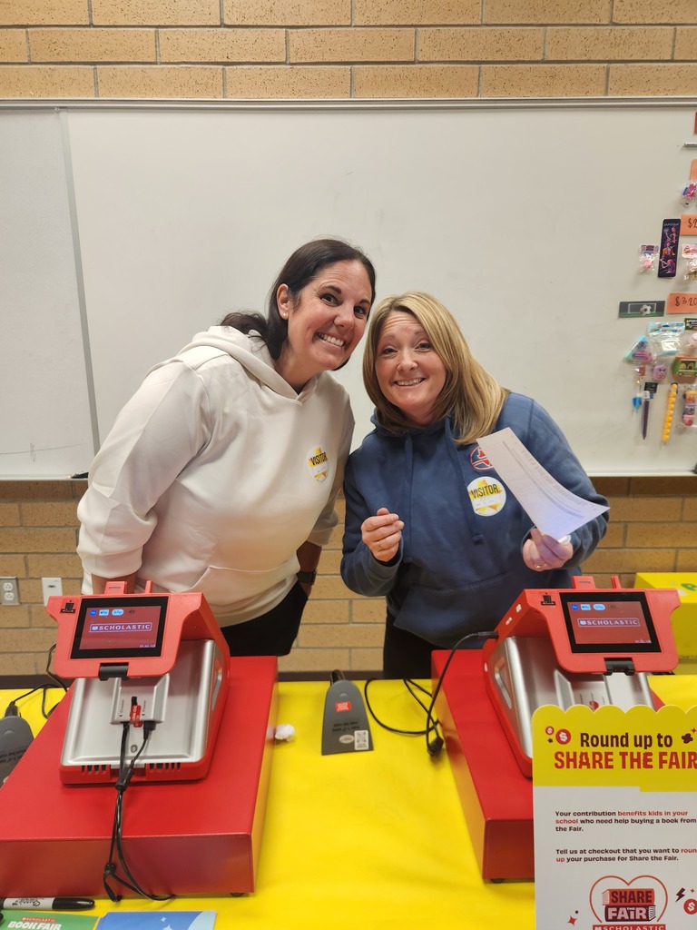 moms posing at book fair
