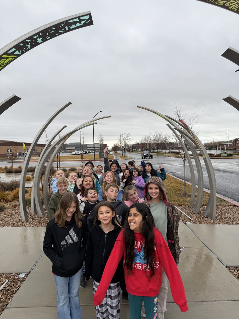 students walking in the rain