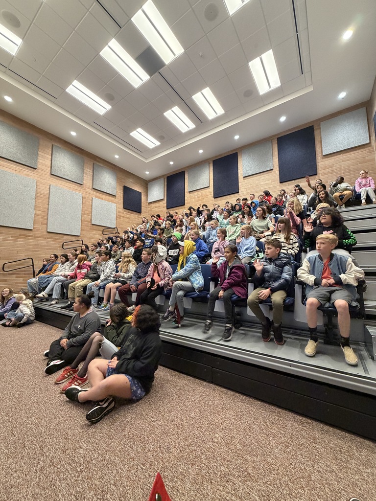students in the middle school bleachers
