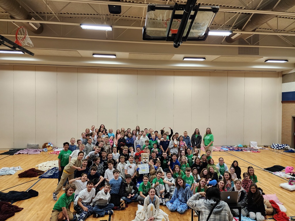 Cosmo posing with our entire fifth grade.