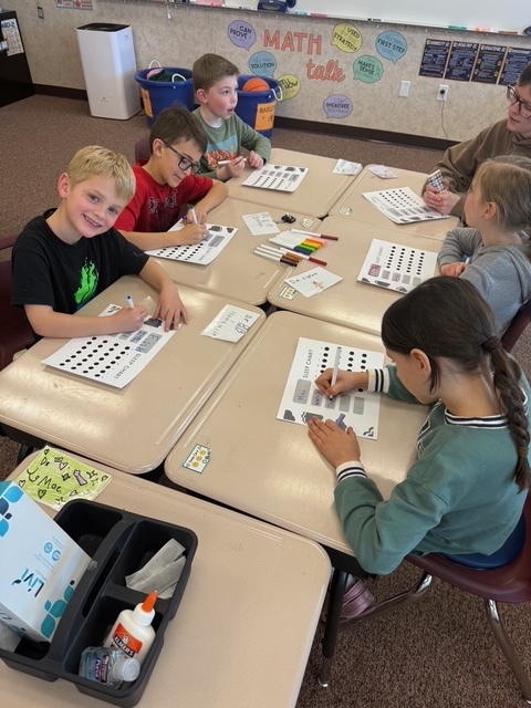Students playing a game with a UVU nursing student.