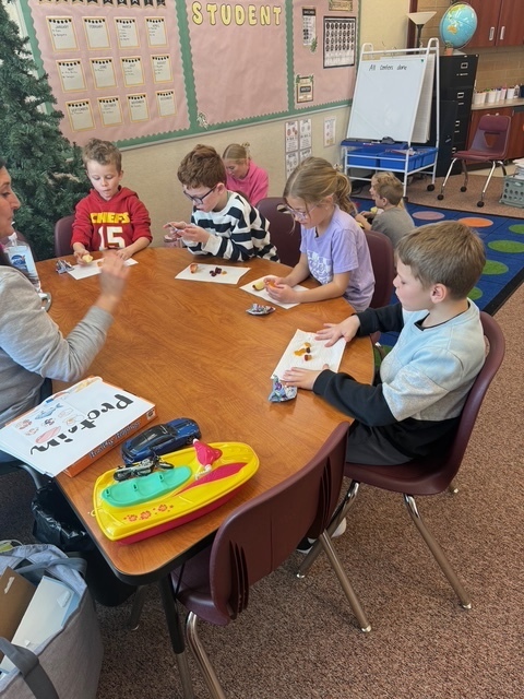 Students playing a game with a UVU nursing student.