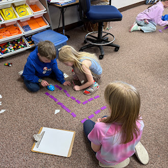 Students creating coding with mice