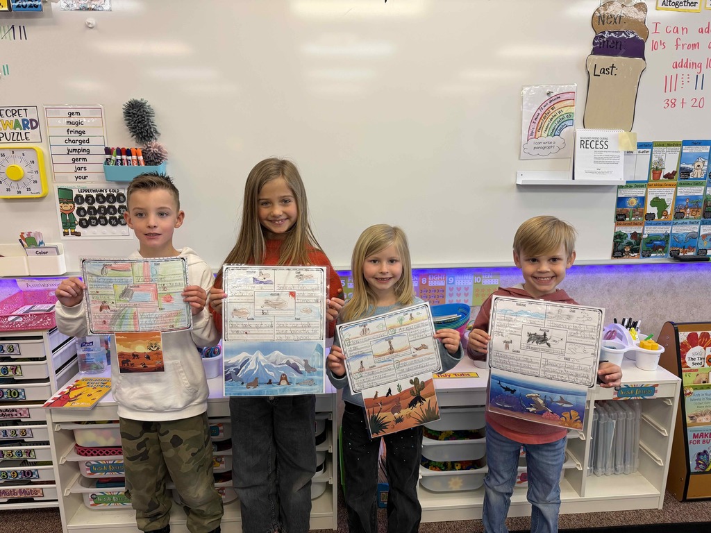 Students showing their finished work.