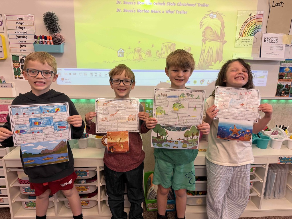 Students showing their finished work.