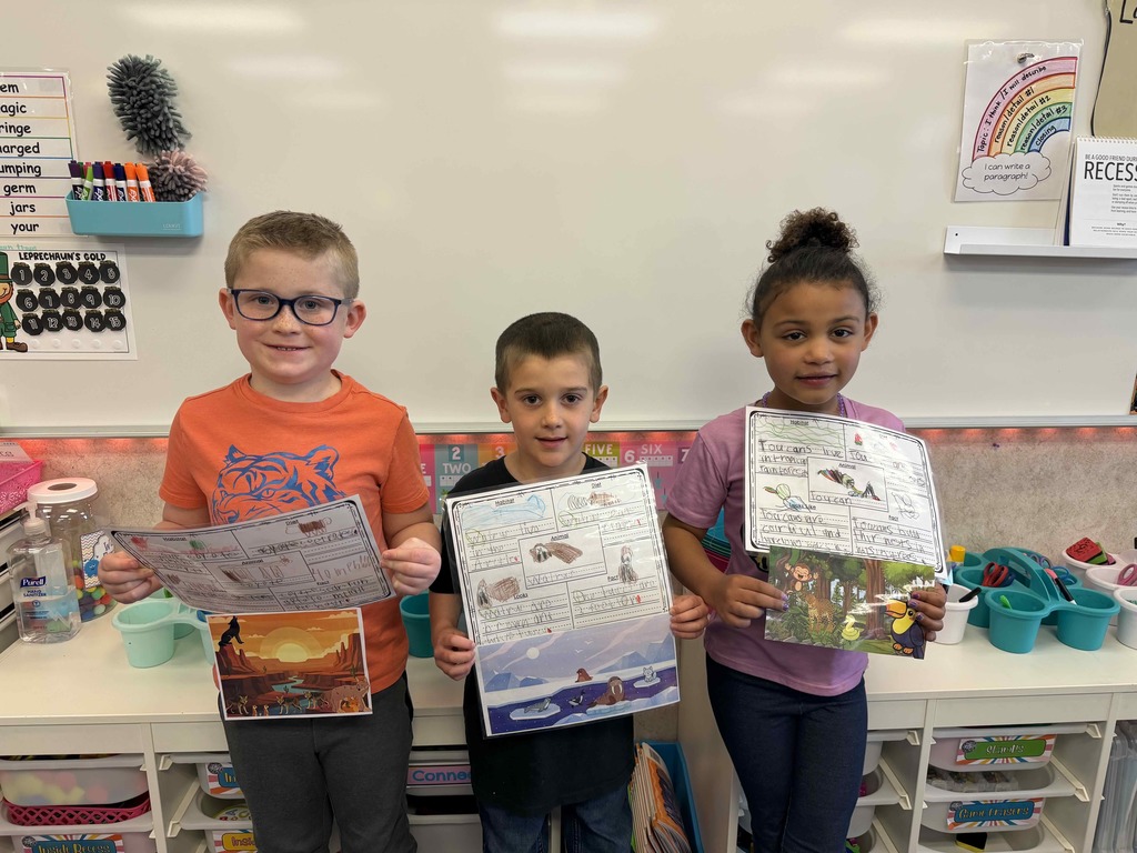 Students showing their finished work.