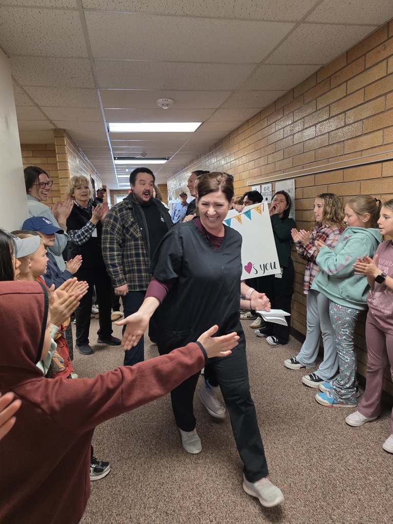 emi's victory lkap around the hall to celebrate classified employee of the year