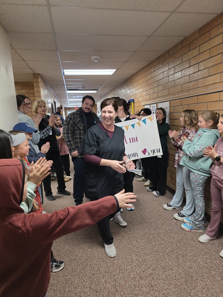 emi's victory lkap around the hall to celebrate classified employee of the year