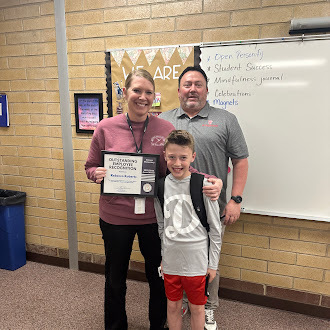 Mrs. Roberts family came to congratulate her