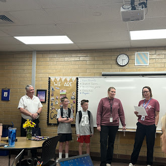 Mrs. O telling the staff about Mrs. Roberts