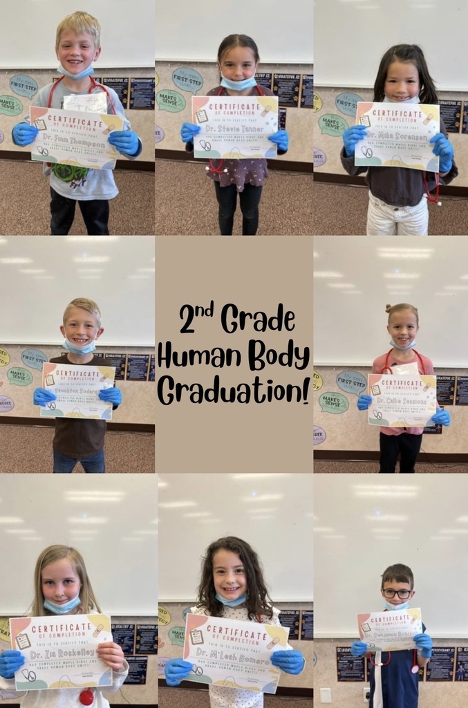 Students holding up their "doctor graduation certificate."