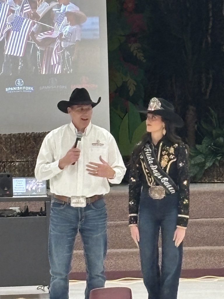 Spanish Fork Rodeo Queen and representitive explaining rodeo events