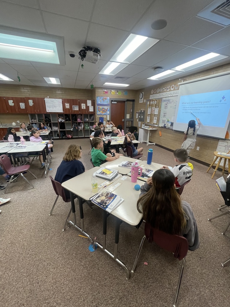 students watching someone at the whiteboard 