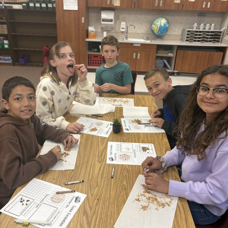 5 students with crushed cookies