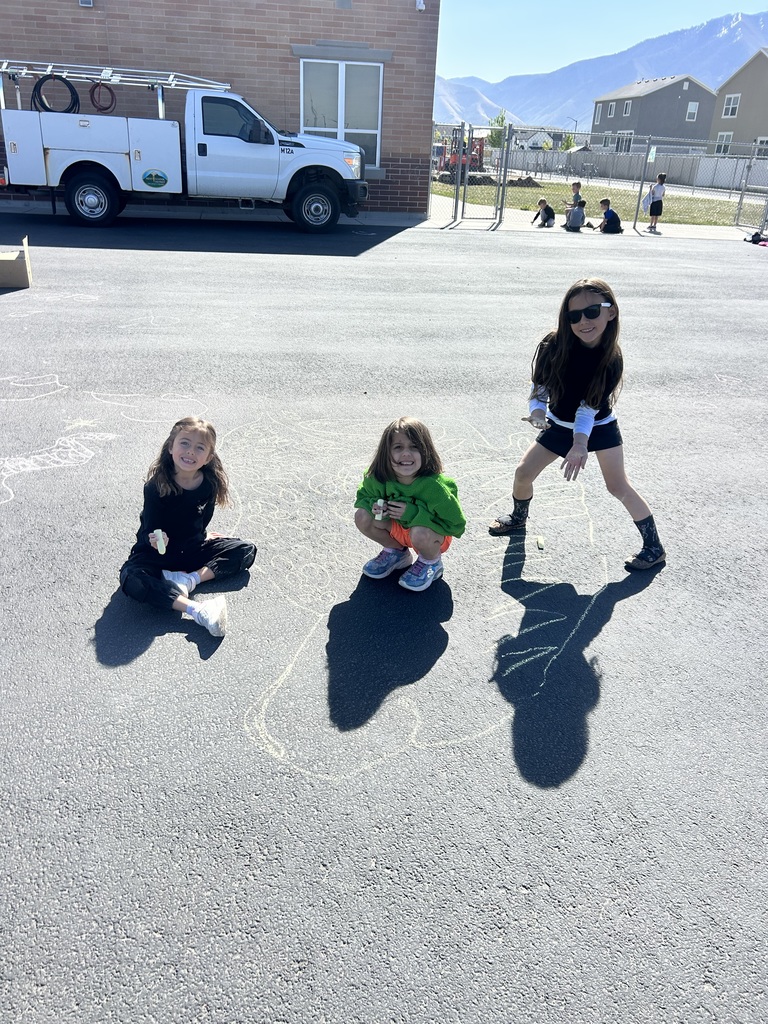 students playing with chalk