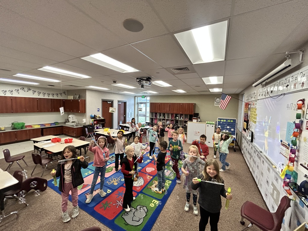 students playing with bubbles