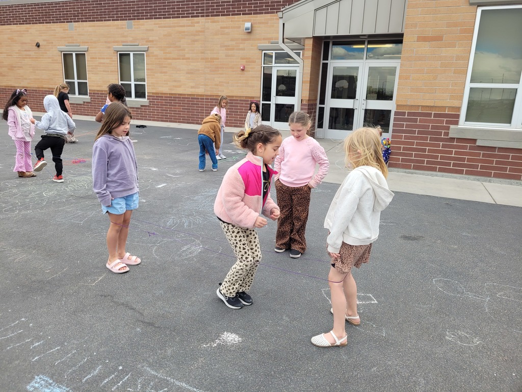 students jump roping