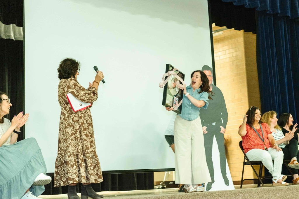 Mrs. Matis getting her platinum record award.
