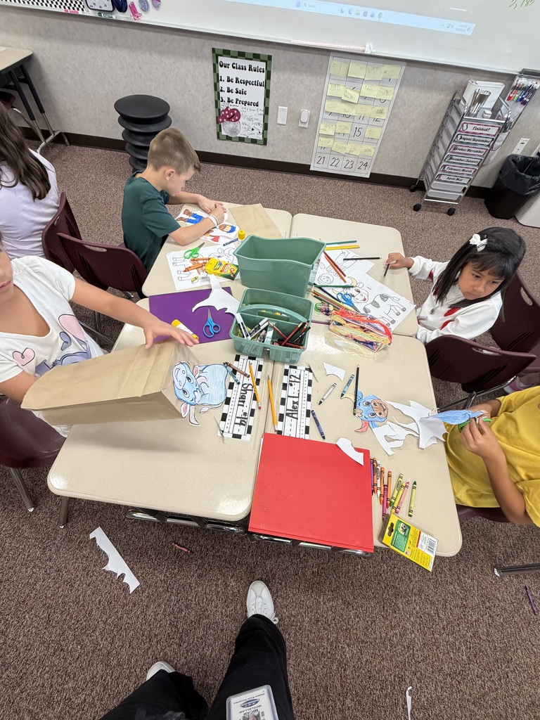 students working on their desks