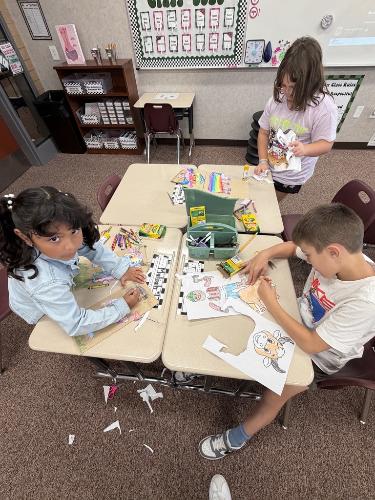 students working on their desks