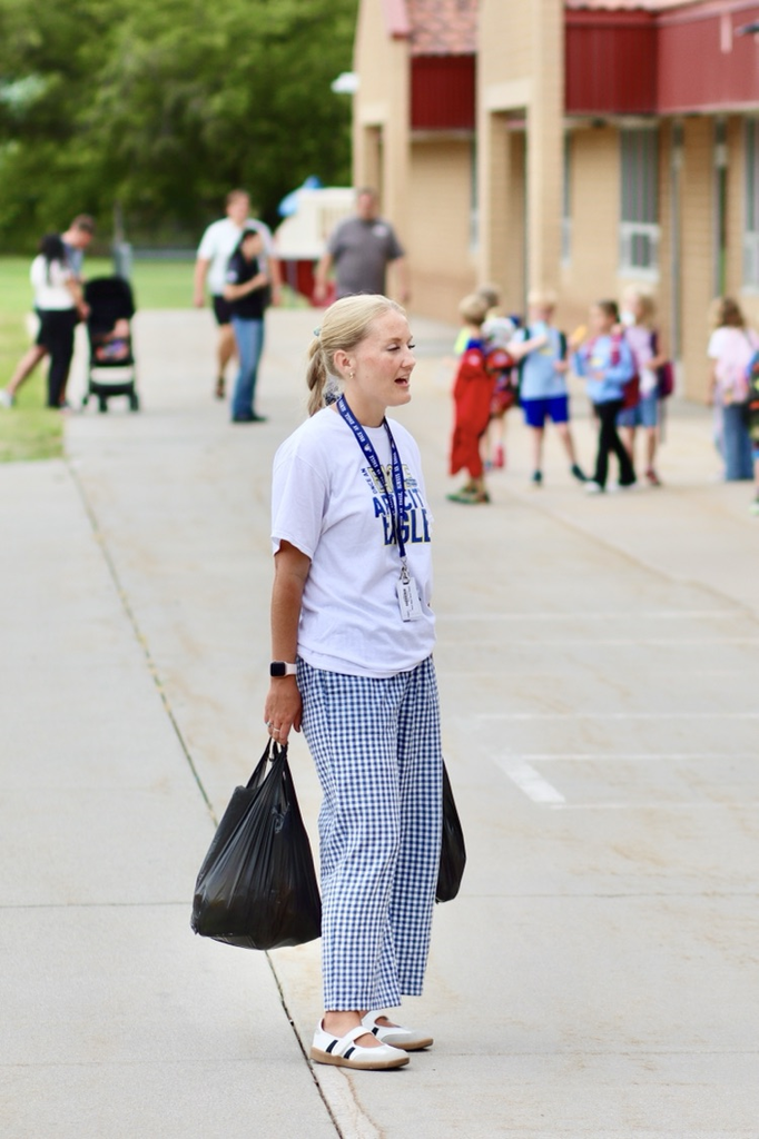 Mrs. Torres is ready with bags full of popsicles to hand out.