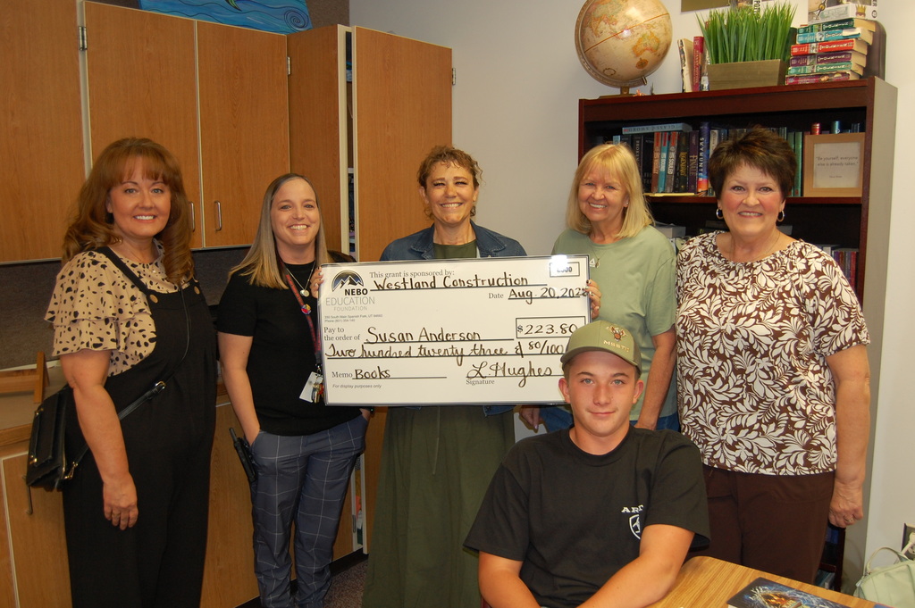 Susan Anderson receiving grant from NEF BOard
