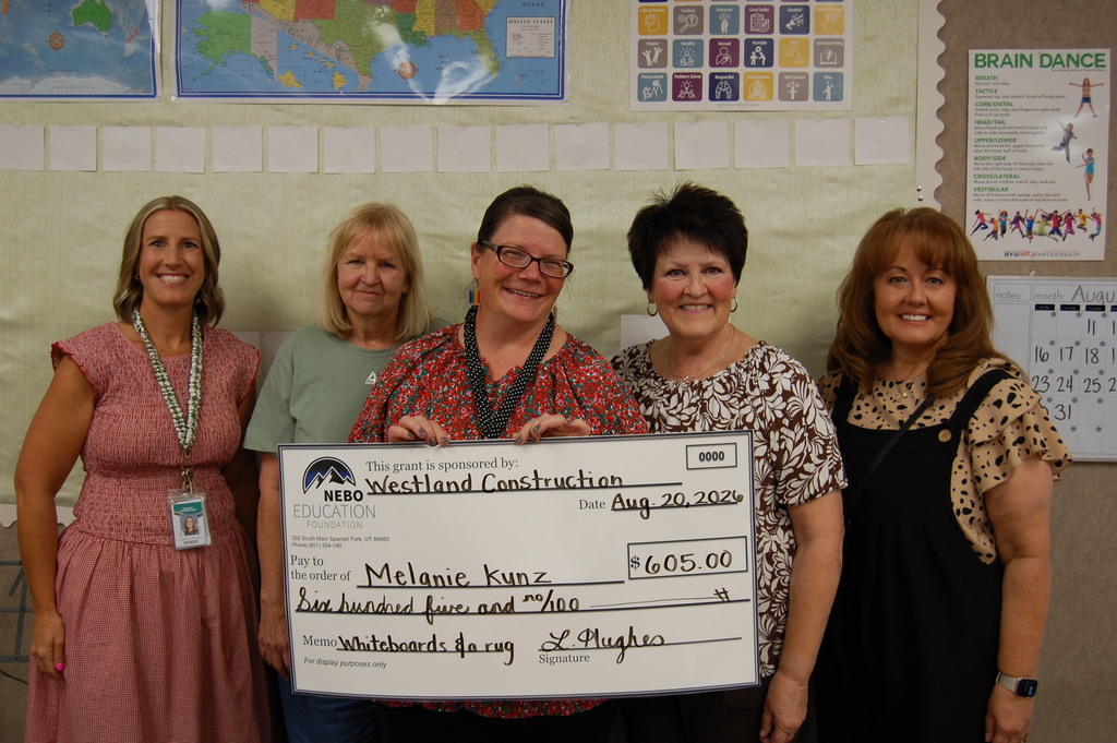 Melanie Kunz receiving grant from NEF Board
