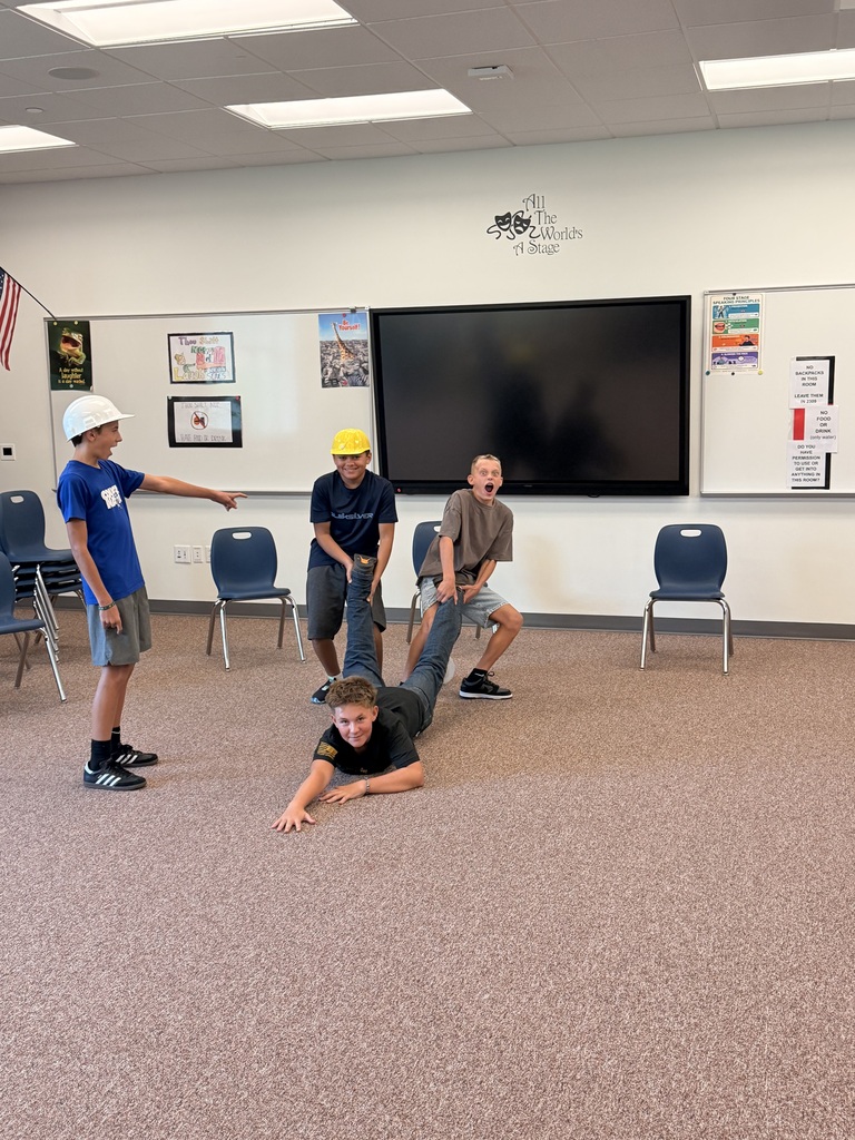 Students performing in the classroom